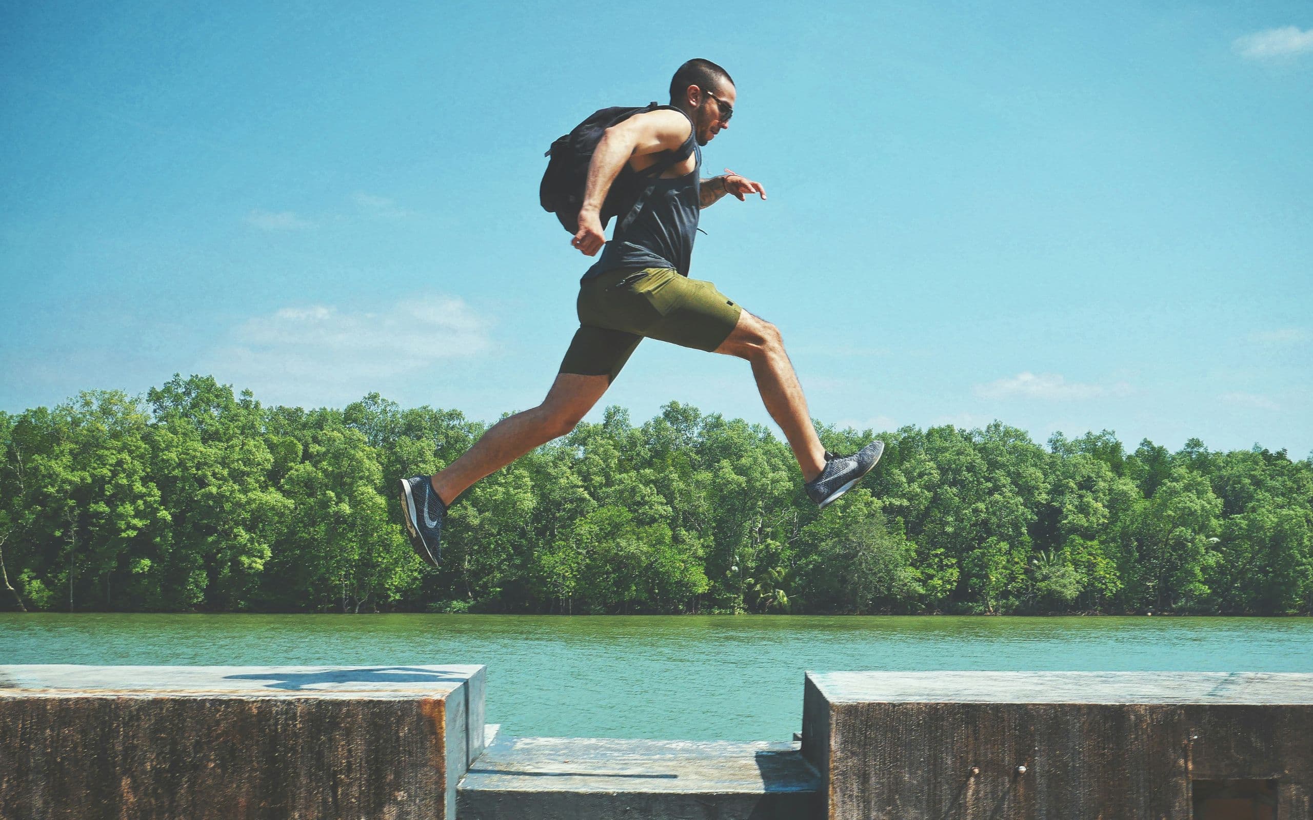 Man taking a decisive leap outdoors, the Nirvu method